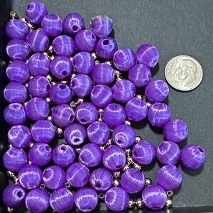 23.  Purple Silk Wrap Beads With Silver Tone Acrylic Spacer Beads